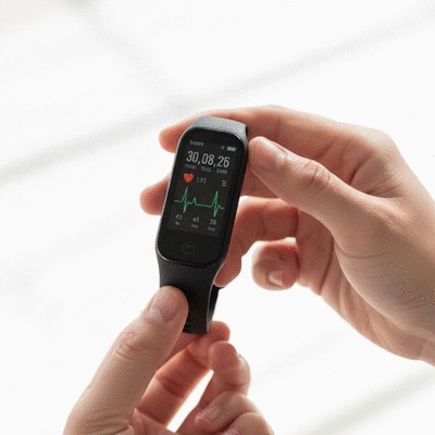 Person using a fitness tracker, symbolizing progress and health tracking